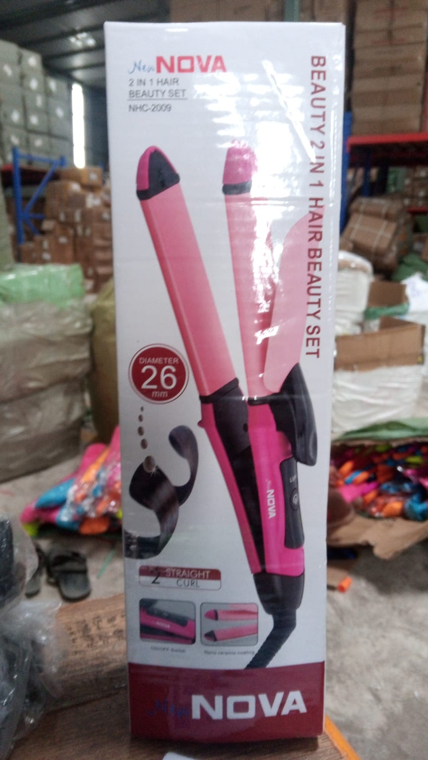 Multi-function hair straightener and curler. Multi-function hair straightener and curler.